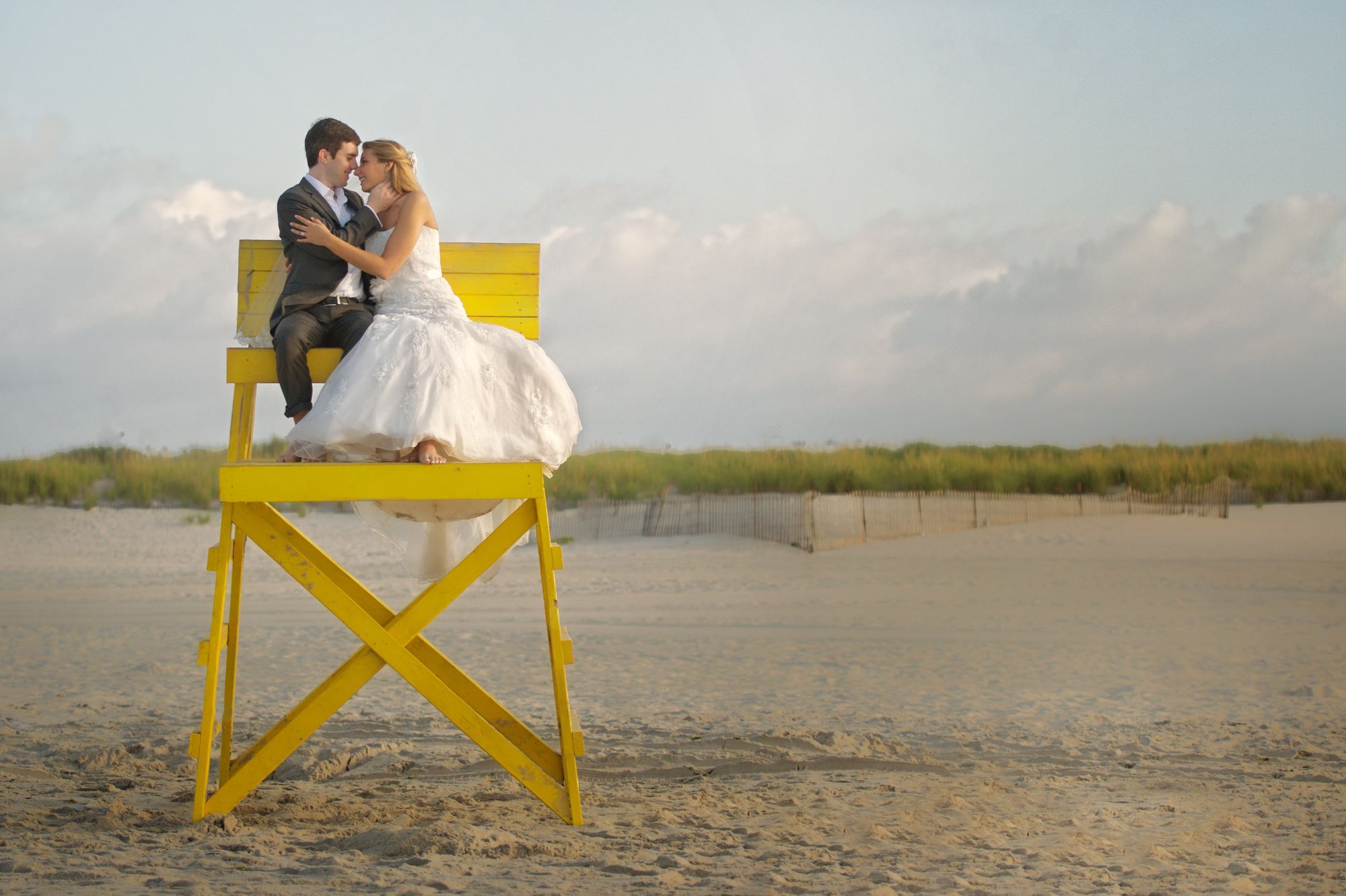 Devin and Michael on a yellow lifeguard chair