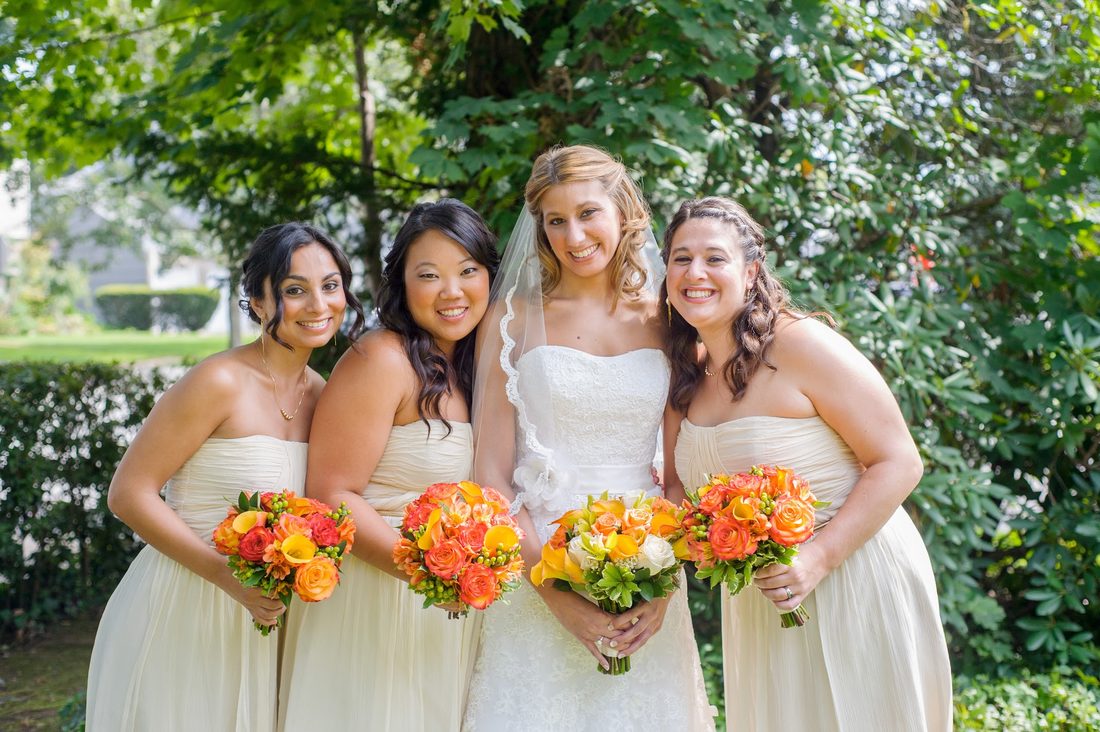 Devin with her bridesmaids and their bouquets