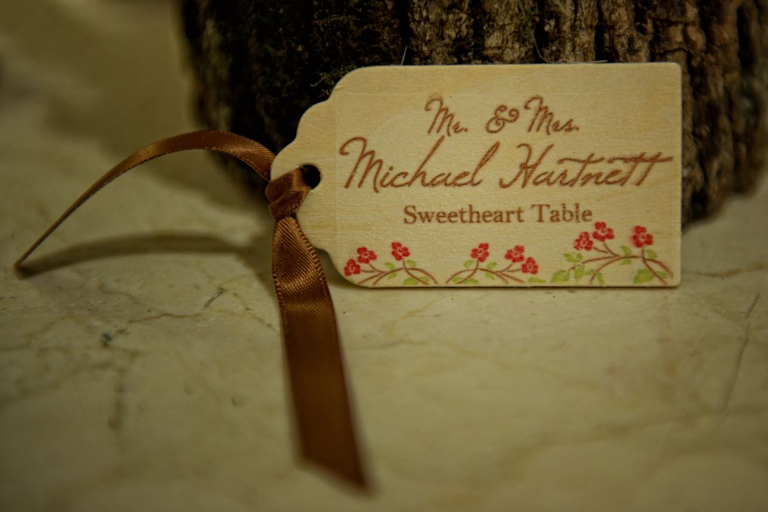 Mom&rsquo;s wood-burned Mr. & Mrs. sweetheart-table sign